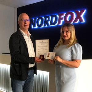 Наградили памятной медалью за заслуги специалиста NordFox